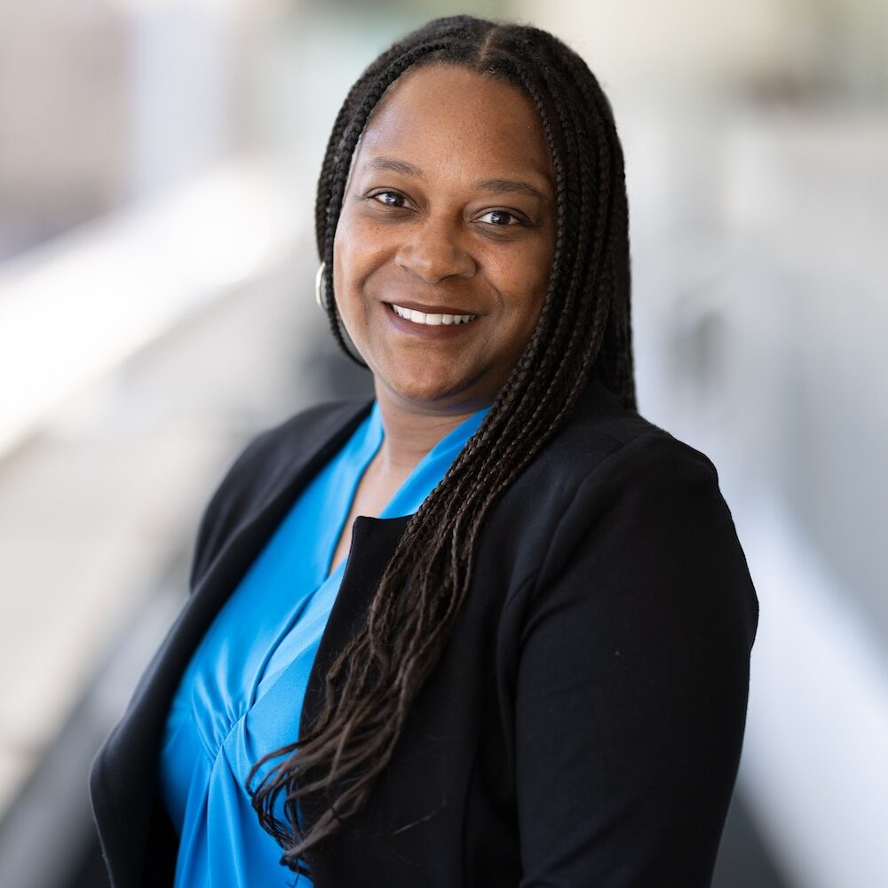 headshot of smiling woman in professional attire